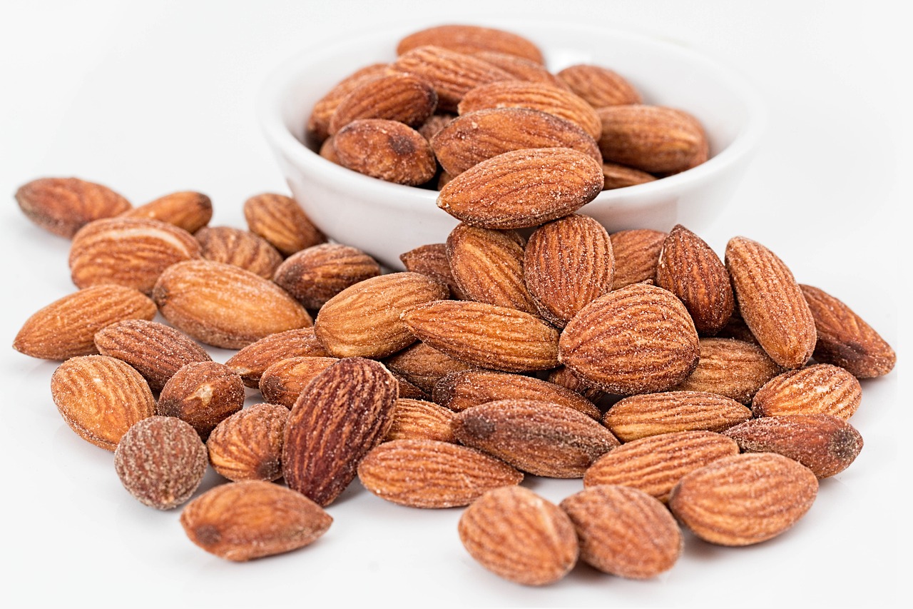 What are the effects of eating soaked almonds on the body?